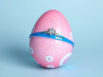 pink glitter egg, tiny diamond garnett ring around egg, blue ring over pink egg, multiple neon rainbow led attachments, and stickers of youngchow china
