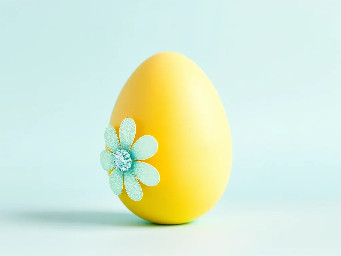 Yellow pastel egg, blue ring over yellow, sparkly flower and circle stickers