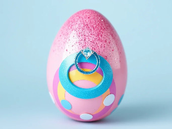 pink glitter egg, tiny diamond garnett, blue ring over pink egg, neon rainbow, and circle stickers